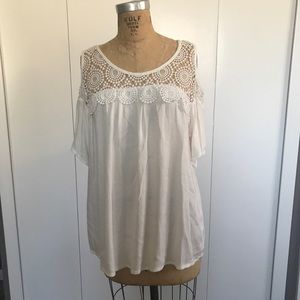 White shoulder cut out top